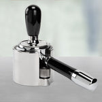ECM Tamperstation made of polished stainless steel with adjustable height for precise tamping.