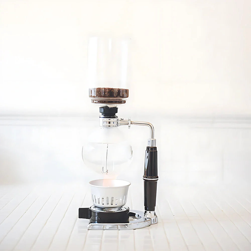 Hario Coffee Syphon Technica TCA 3 Cup on table, showcasing vacuum method for optimal aroma release.