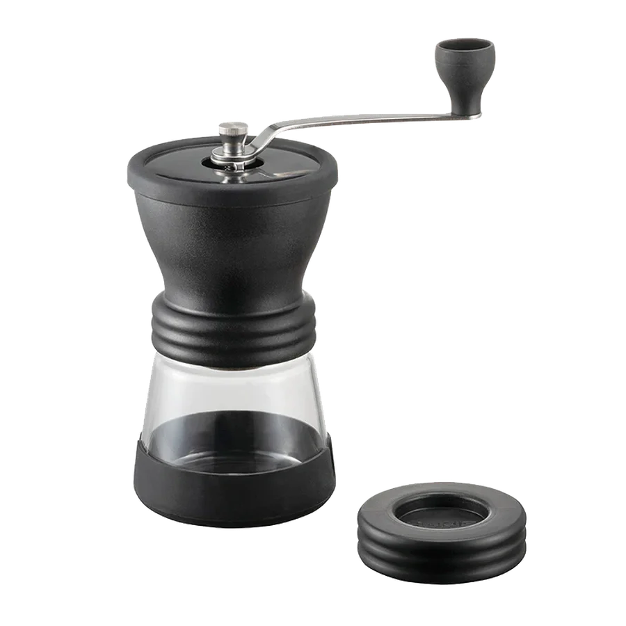 Hario Keramikkaffeemühle Skerton N with ceramic grinder and glass container.