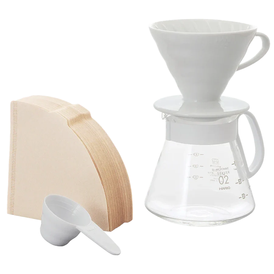 Hario V60 Ceramic Dripper Set 02 in white with filters and glass carafe.